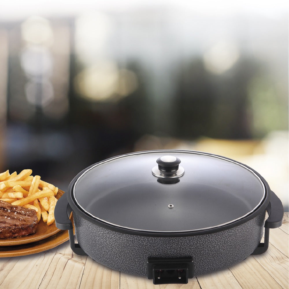 Paellera Eléctrica, Plato de Pizza, Sartén Eléctrica con Tapa de Cristal Templado y Revestimiento Antiadherente, Potencia 1500W, Control de Termostato Ajustable, Asas para Facilitar el Transporte, Fácil de Limpiar